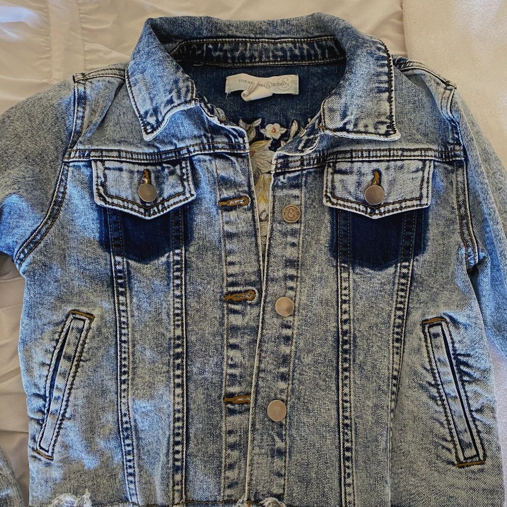Medium wash denim jacket with flower embroidery!